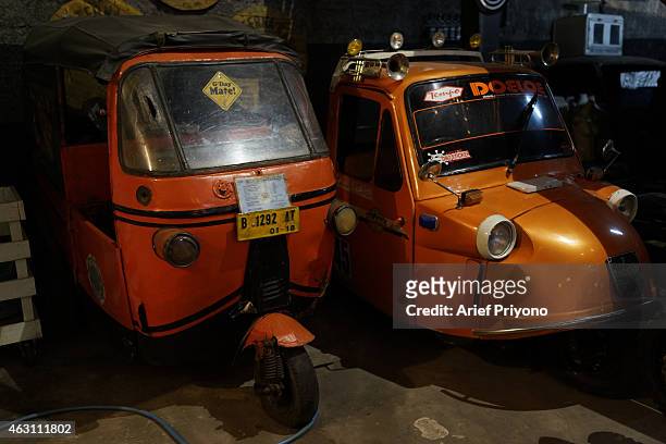 Old public transport vehicles called "Bajaj" on display at the ManShed Cafe, Sanur. The ManShed cafe in Sanur, Bali is themed on an old style garage...