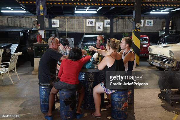 Expats and tourists enjoy hanging out in ManShed Cafe, Sanur. The ManShed cafe in Sanur, Bali is themed on an old style garage and is full of...
