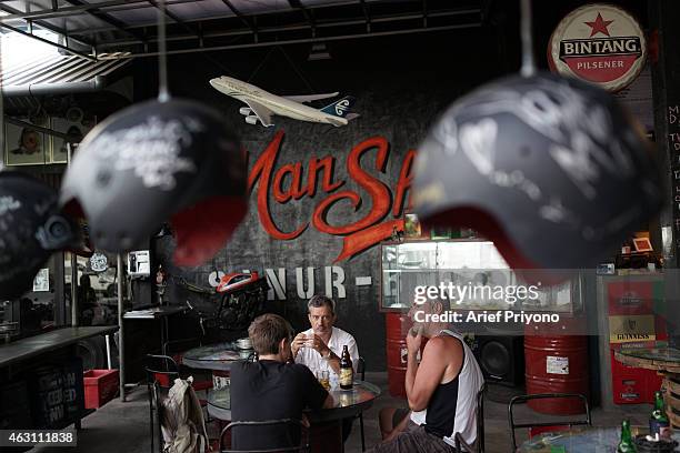 Expats and tourists enjoy hanging out in ManShed Cafe, Sanur. The ManShed cafe in Sanur, Bali is themed on an old style garage and is full of...