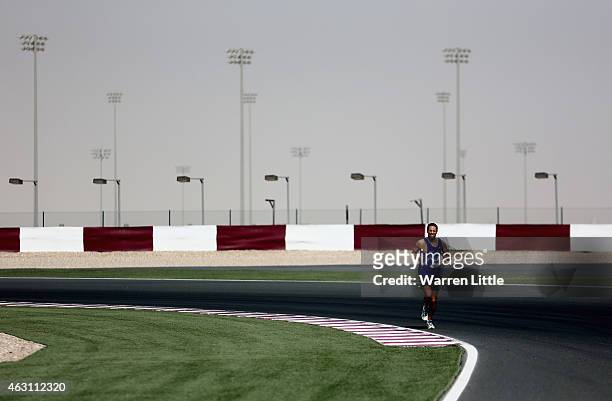 Mounier Bouzaiane of France en route to winning the Men's 5Km during the Dolphin Energy Doha Dash at Losail Circuit on February 10, 2015 in Doha,...