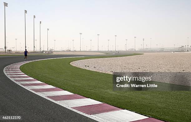 Mounier Bouzaiane of France en route to winning the Men's 5Km during the Dolphin Energy Doha Dash at Losail Circuit on February 10, 2015 in Doha,...