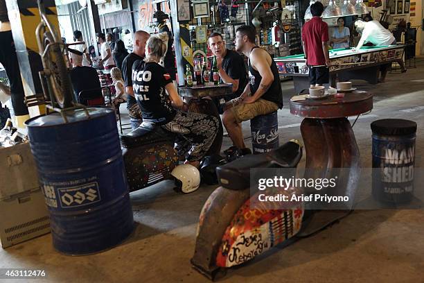 Expats and tourists enjoy hanging out in ManShed Cafe, Sanur. The ManShed cafe in Sanur, Bali is themed on an old style garage and is full of...