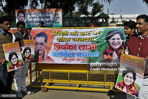 Congress supporters demonstrating outside AICC for their demand induct Priyanka Gandhi to save Congress after party's poor performance in Delhi...