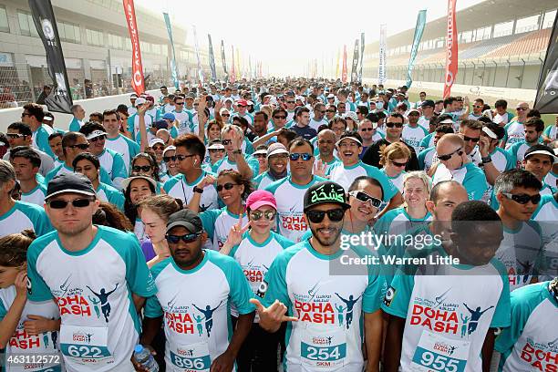 Competitors prepare to start the 3km race during the Dolphin Energy Doha Dash at Losail Circuit on February 10, 2015 in Doha, Qatar. Taking place on...