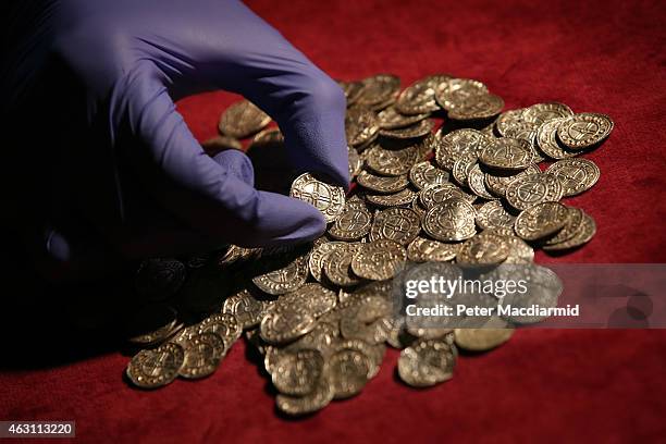 Anglo Saxon silver pennies are displayed at The British Museum on February 10, 2015 in London, England. Rare coins and other finds are being shown as...