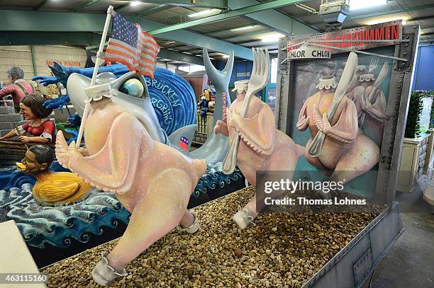 Carnival parade float satirizing the free trade agreement TTIP under the motto 'Invasion der Chlorhuehnchen' at the MCV work shop on February 10,...