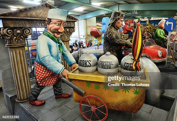 Carnival parade float satirizing the drog usage of member of the Bundestag at the MCV work shop on February 10, 2015 in Mainz, Germany. The Mainz...