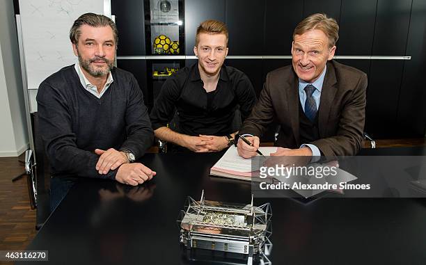 Borussia Dortmund Sports Director Michael Zorc, Marco Reus of Borussia Dortmund and Borussia Dortmund CEO Hans-Joachim Watzke are seen as Marco Reus...