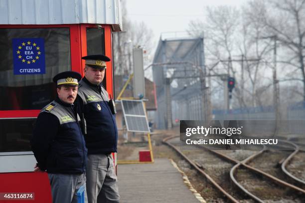 Romanian border police officers patrol the Ungheni train station at the border with Moldova on January 18, 2011. Romanian border police is tightening...