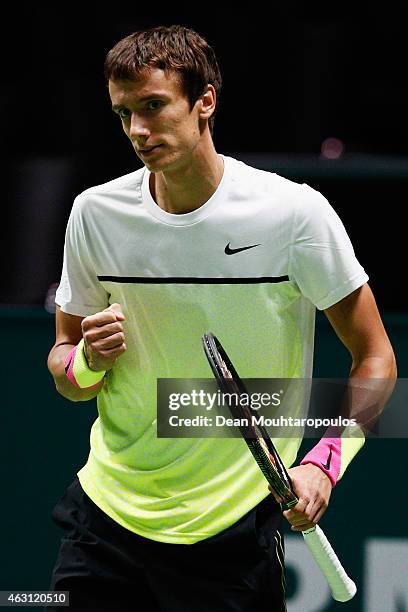 Andrey Kuznetsov of Russia reacts to winning a game against Milos Raonic of Canada during day 2 of the ABN AMRO World Tennis Tournament held at the...