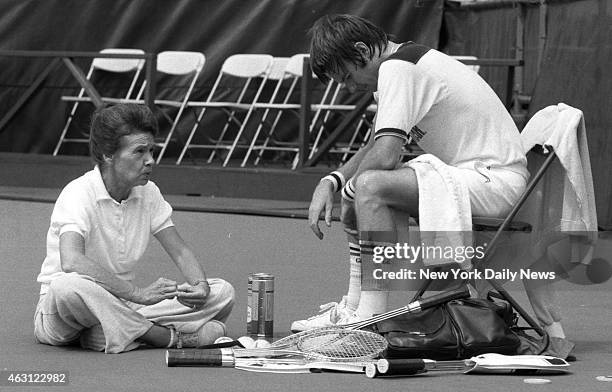 Jimmy Connors listens intently to his mother, Gloria, after workout at National Tennis Center in Flushing Meadow.