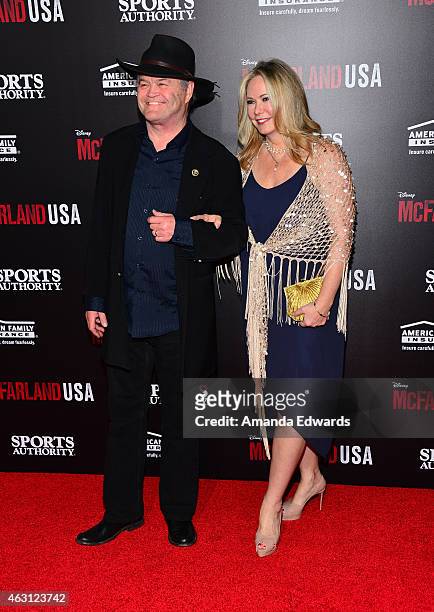 Musician Micky Dolenz and Donna Quinter arrive at the world premiere of Disney's "McFarland, USA" at the El Capitan Theatre on February 9, 2015 in...