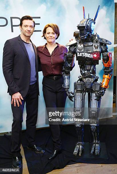 Actors Hugh Jackman and Sigourney Weaver attend the "Chappie" Cast Photo Call at Crosby Street Hotel on February 10, 2015 in New York City.