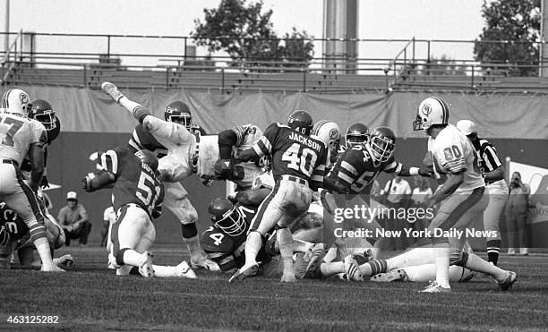 Football New York Jets v Miami Dolphins at Shea Stadium Dolphins' Tony Nathan takes a horizontal view of the action.