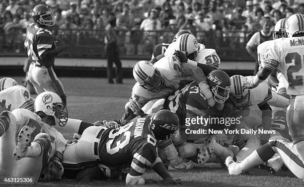 Football New York Jets v Miami Dolphins at Shea Stadium In one of few bright spots for Jets, Mike Augustyniak scores in 2d period.