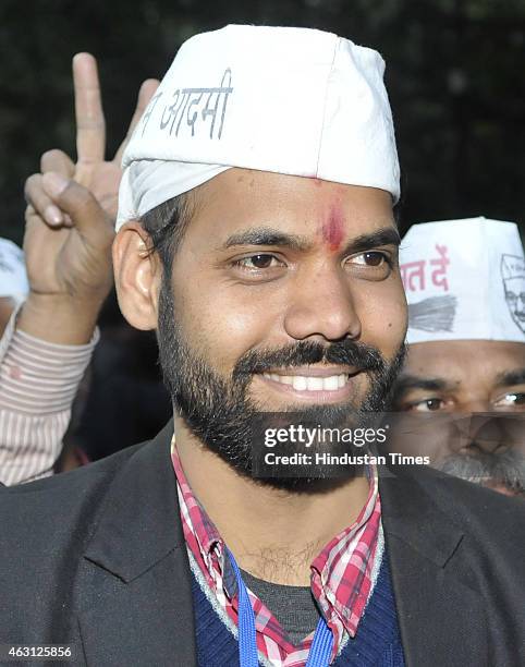 Newly elected AAP MLA from Jangpura constituency Praveen Kumar arrives for first meeting with Arvind Kejriwal at Constitution Club on February 10,...