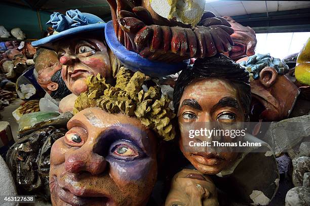 Old Carnival sculptures lie in a corner of the MCV Carnival club work shop while the MCV members present the new parade floats for Rose Monday on...