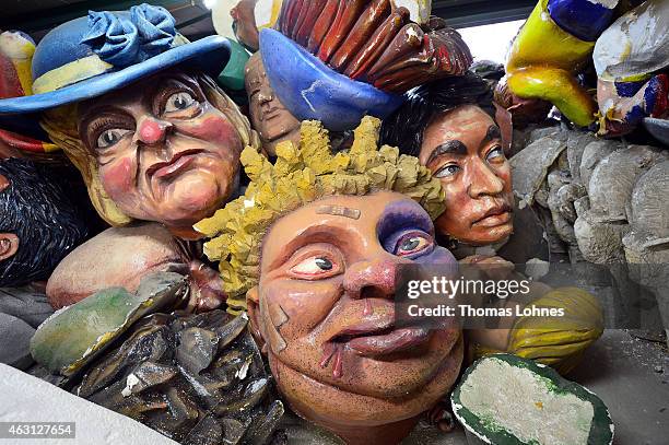Old Carnival sculptures lie in a corner of the MCV Carnival club work shop while the MCV members present the new parade floats for Rose Monday on...