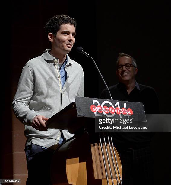 Filmmaker Damien Chazelle and Sundance Film Festival Director John Cooper appear onstage at the premiere of "Whiplash" at the Eccles Center Theatre...