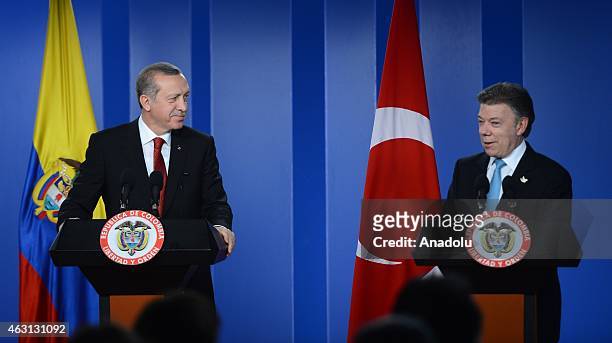 Turkey's President Recep Tayyip Erdogan and Colombian President Juan Manuel Santos hold a press conference after their meeting in Bogota on February...