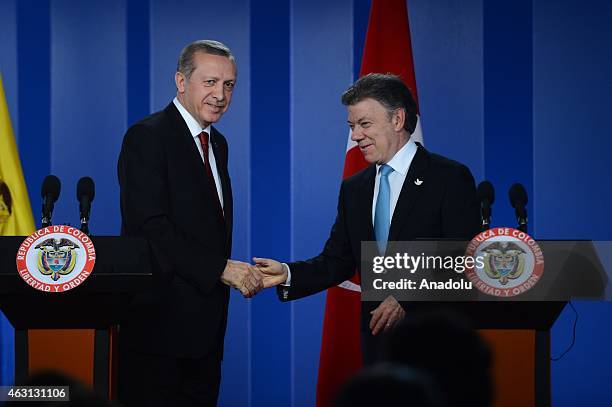 Turkey's President Recep Tayyip Erdogan and Colombian President Juan Manuel Santos hold a press conference after their meeting in Bogota on February...