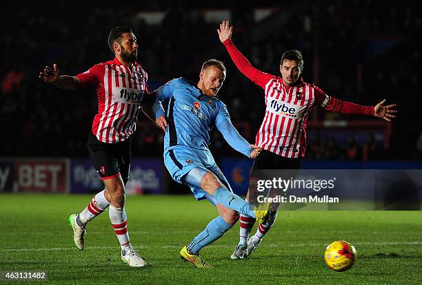 Robbie Simpson of Cambridge United scores his side's opening goal during the Sky Bet League Two match between Exeter City and Cambridge United at St....