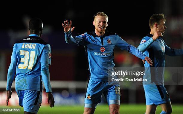 Robbie Simpson of Cambridge United celebrates scoring his side's opening goal during the Sky Bet League Two match between Exeter City and Cambridge...