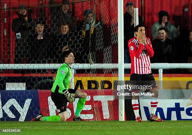 Craig Woodman of Exeter City reacts after scoring an own goal during the Sky Bet League Two match between Exeter City and Cambridge United at St....