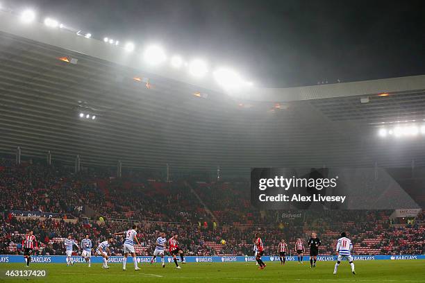 General view of play as fog hangs over the stadium during the Barclays Premier League match between Sunderland and Queens Park Rangers at Stadium of...