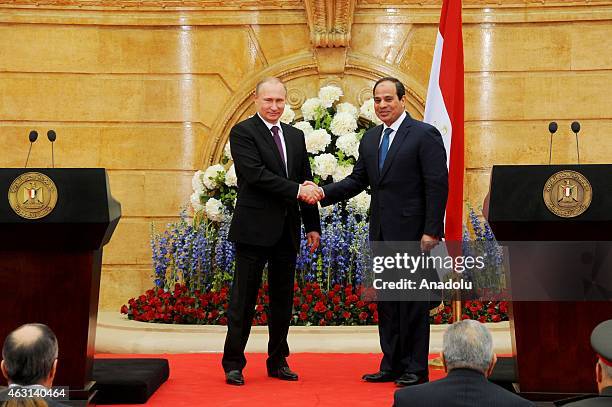 Russian President Vladimir Putin and Egyptian President Abdel Fattah el-Sisi hold a press conference after their meeting at the Kubbe Palace in...