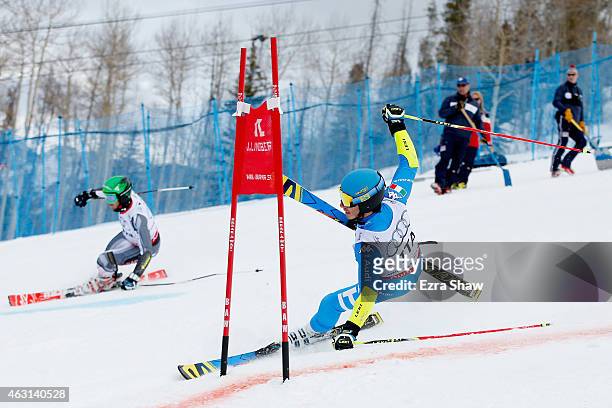 Giovanni Borsotti of Italy loses his balance against Phil Brown of Canada during the Nations Team Event at Golden Peak Stadium on Day 9 of the 2015...