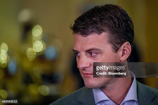 Matt Maloney, co-founder and chief executive officer of GrubHub Inc., listens during a Bloomberg television interview at the Goldman Sachs Technology...