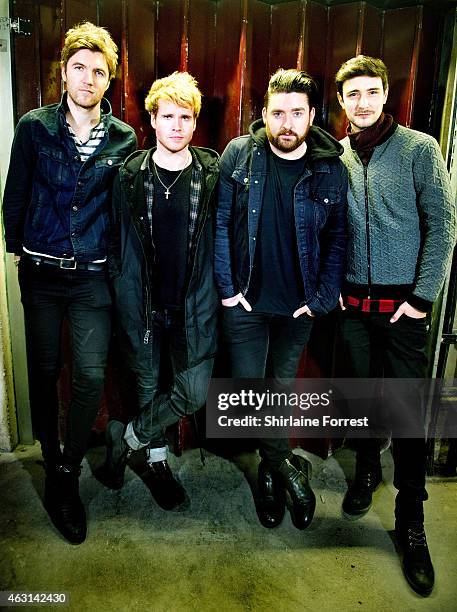 Steve Garrigan, Vinny May, Jason Boland and Mark Prendergast of Kodaline pose backstage after performing and signing copies of their new album...