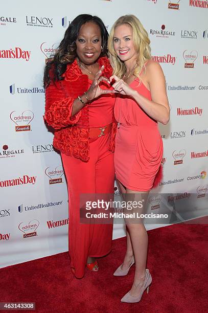 Star Jones and Laura Bell Bundy attend the Woman's Day Red Dress Awards on February 10, 2015 in New York City.