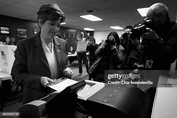 Republican U.S. Senate candidate Joni Ernst casts her ballot on election day at the polling place in her hometown fire department November 4, 2014 in...