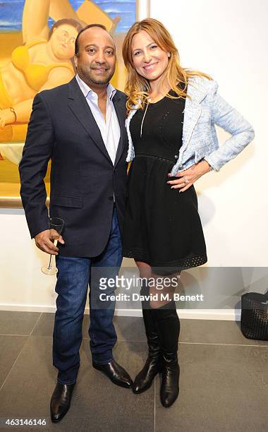 Ron Wahid and Magdalena Kruszewska attend a private view of the Fernando Botero exhibition at The Opera Gallery on February 10, 2015 in London,...