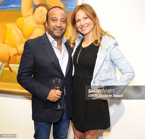 Ron Wahid and Magdalena Kruszewska attend a private view of the Fernando Botero exhibition at The Opera Gallery on February 10, 2015 in London,...