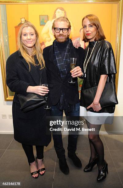 Lilly Barton, Alistair Guy and Vanessa Arelle attend a private view of the Fernando Botero exhibition at The Opera Gallery on February 10, 2015 in...