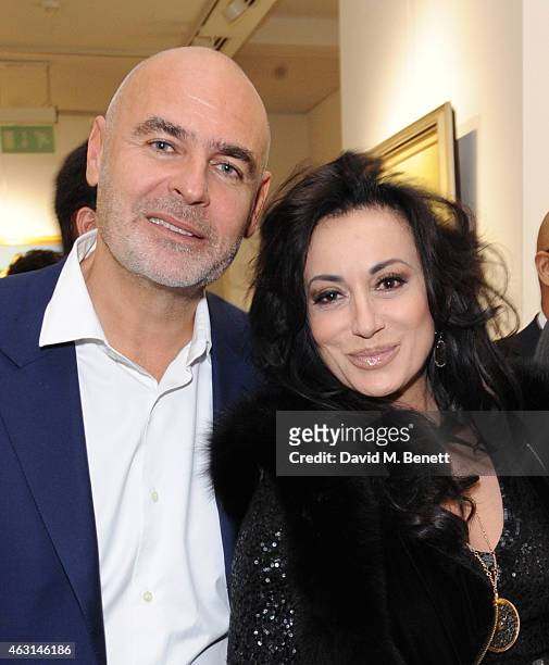 Gilles Dyan and Nancy Dell'olio attend a private view of the Fernando Botero exhibition at The Opera Gallery on February 10, 2015 in London, England.