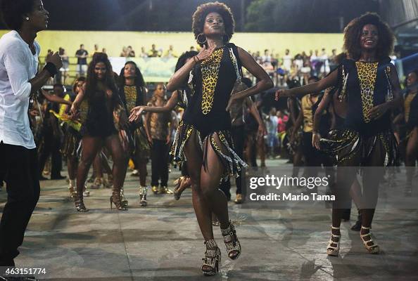 Dancers from the G.R.E.S. Sao Clemente samba school perform during ...
