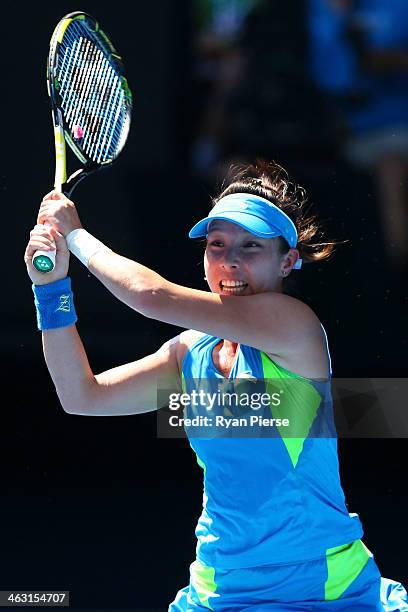 Jie Zheng of China plays a backhand in her third round match against Casey Dellacqua of Australia during day five of the 2014 Australian Open at...