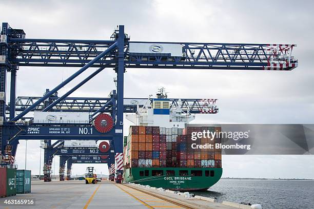 Gantry cranes load containers onto the China Shipping Container Lines Co. CSCL Brisbane container ship at Terminal 3 of Port Botany, operated by...