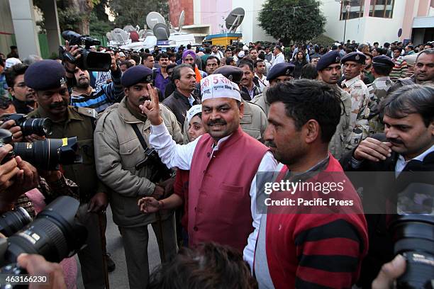 Aam Aadmi Party winning Candidate from Adarsh Nagar Assembly constituency Pawan Sharma arrives for a meeting in Delhi . Results from Delhi are a...