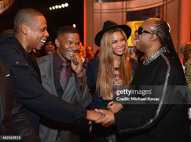 Record producer/recording artist Jay-Z, actor Jamie Foxx, recording artist Beyonce and honoree Stevie Wonder attend Stevie Wonder: Songs In The Key...