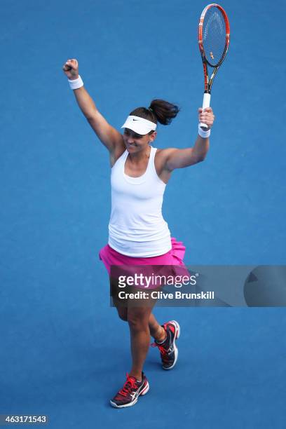 Casey Dellacqua of Australia celebrates winning match point in her third round match against Jie Zheng of China during day five of the 2014...
