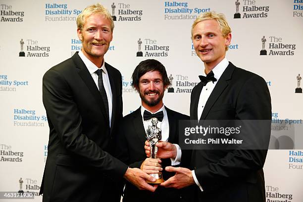 Eric Murray, Caleb Shepherd and Hamish Bond hold the Halberg award for Team of the Year at the 2015 Halberg Awards at Vector Arena on February 11,...