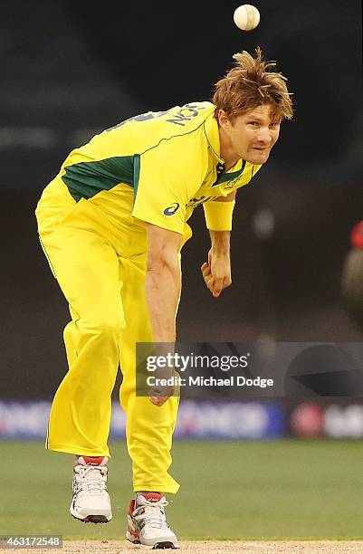 Shane Watson of Australia bowls during the Cricket World Cup warm up match between Australia and the United Arab Emirates at Melbourne Cricket Ground...