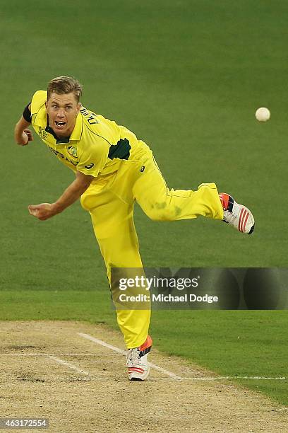 Xavier Doherty of Australia bowls during the Cricket World Cup warm up match between Australia and the United Arab Emirates at Melbourne Cricket...