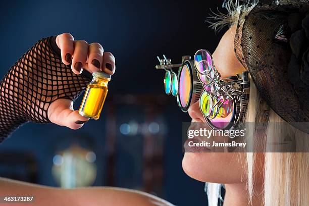 magic potion is ready - golden goggles stock pictures, royalty-free photos & images