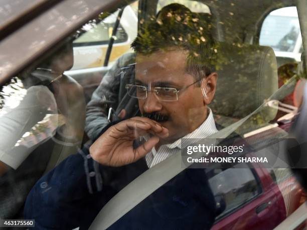 Aam Aadmi Party's Delhi chief minister-designate Arvind Kejriwal arrives for a meeting with Indian Home Minister Rajnath Singh in New Delhi on...